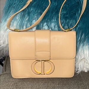 Chic Beige Crossbody Bag with Gold Accents